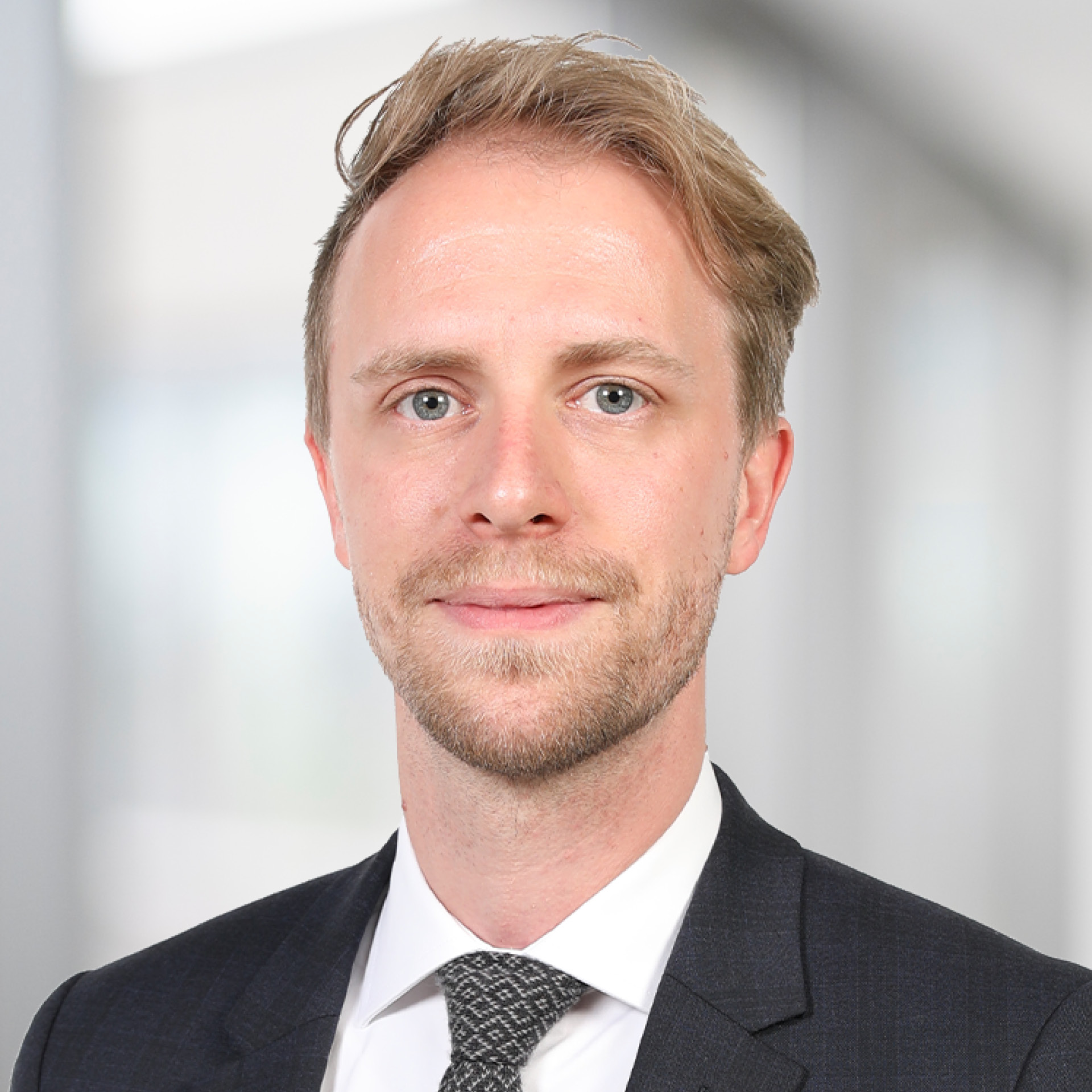 a man in a suit and tie