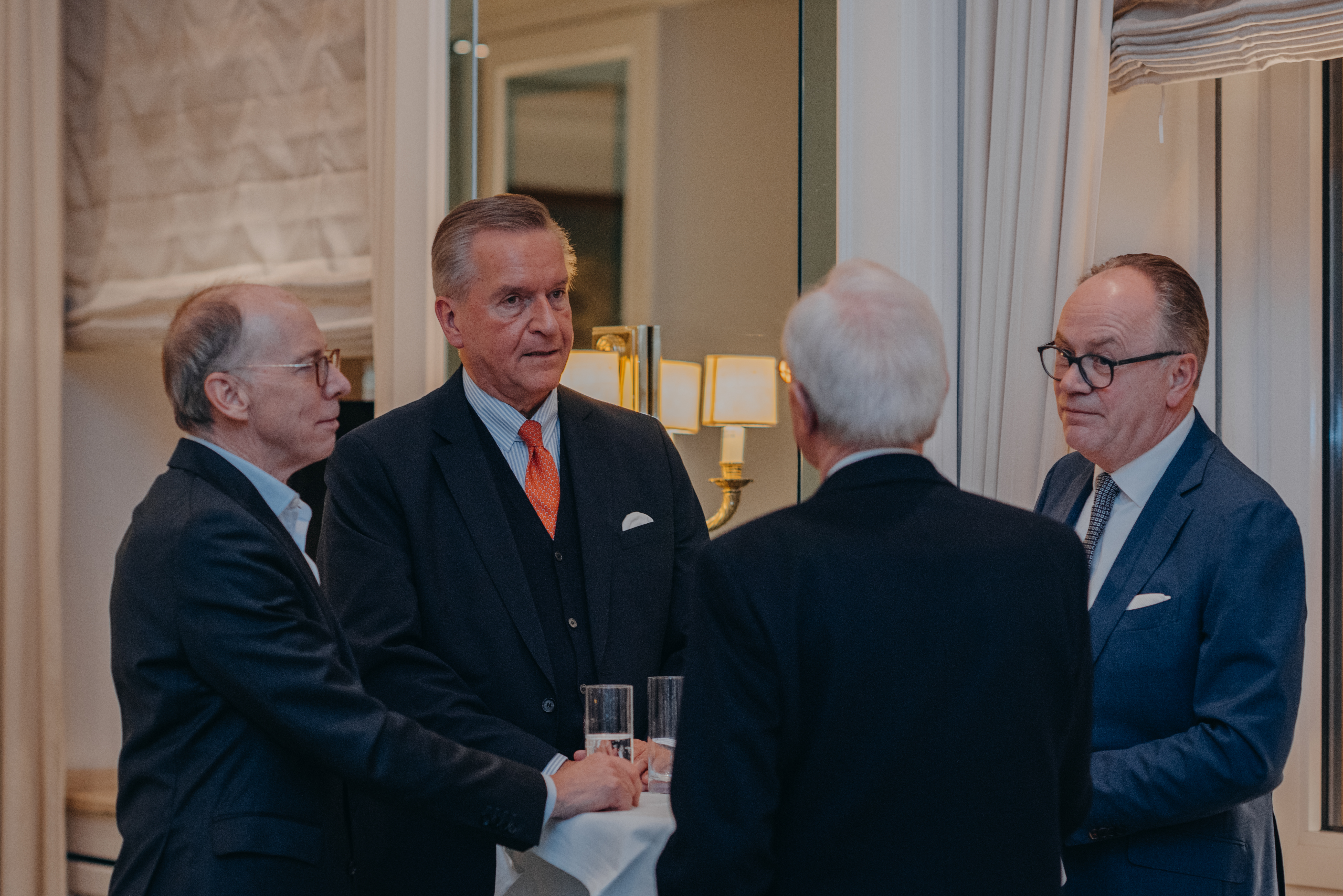 a group of men in suits a group of men in suits
