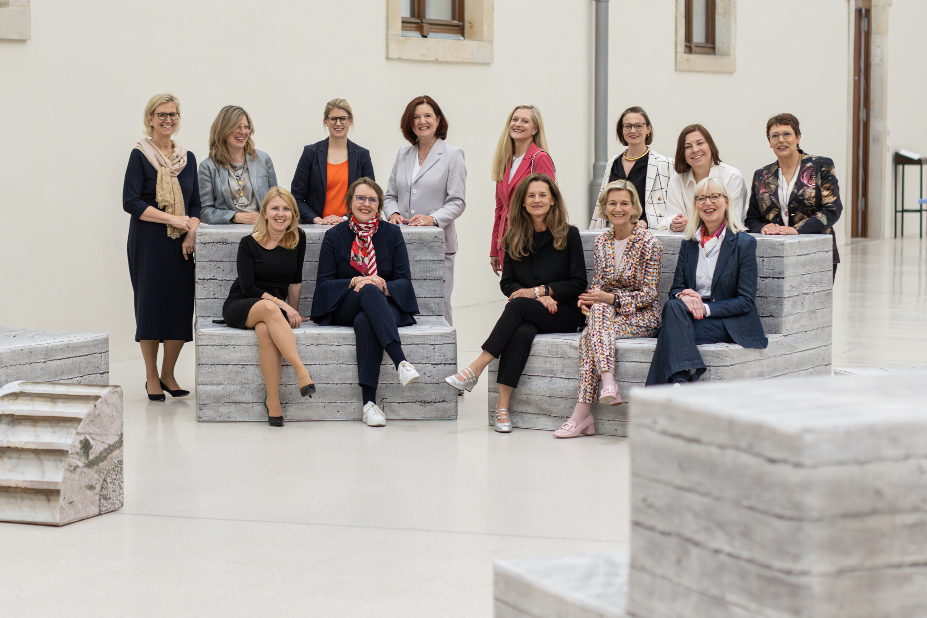 a group of women posing for a photo