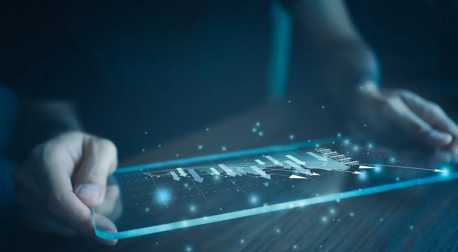 a person holding a transparent device a person holding a transparent device