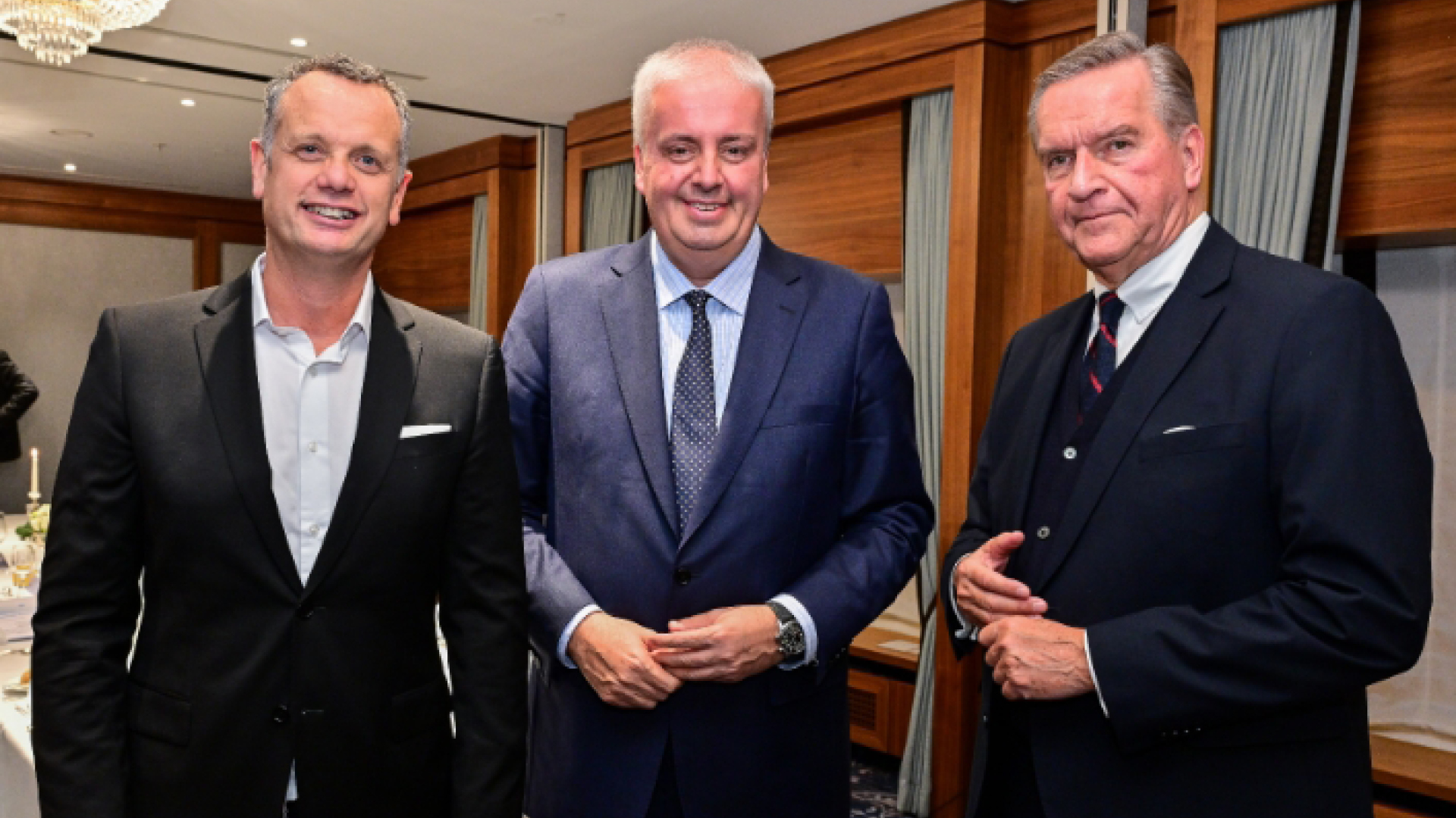 a group of men in suits a group of men in suits