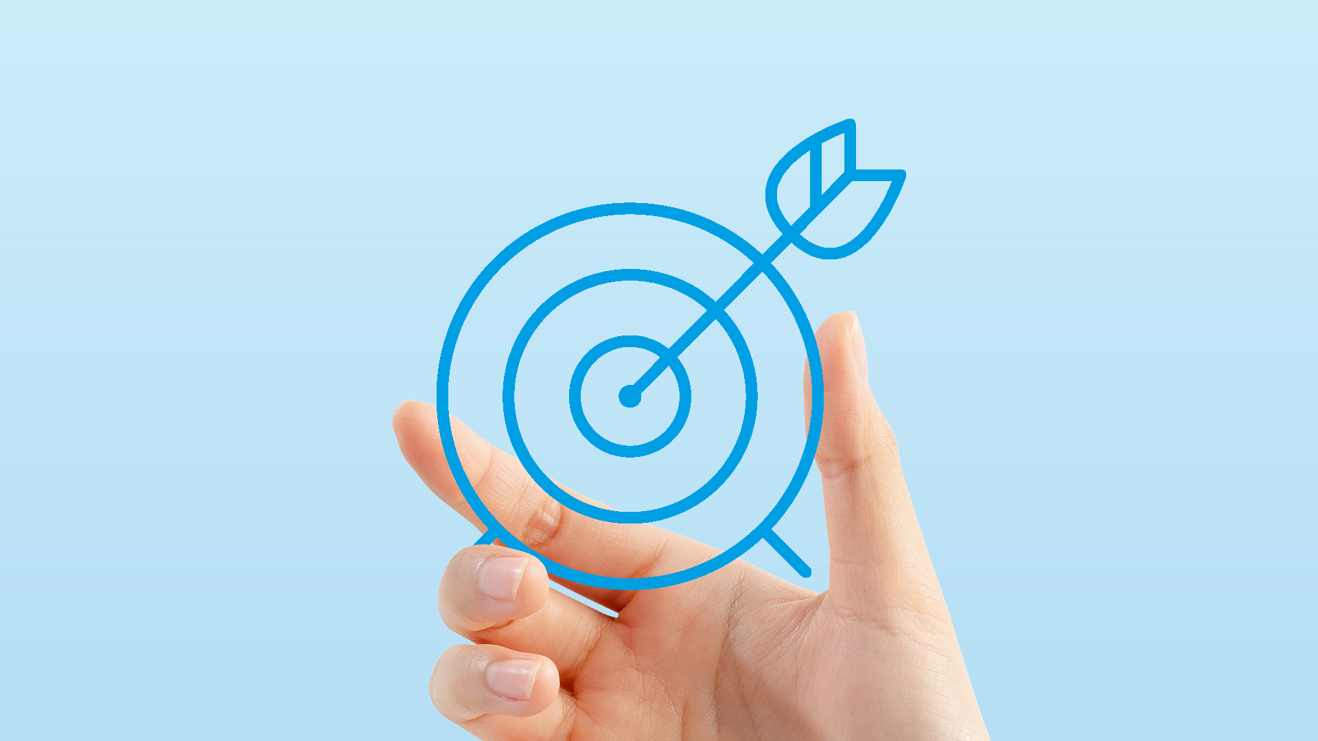 eine Hand, die eine Zeichnung eines Ziels hält