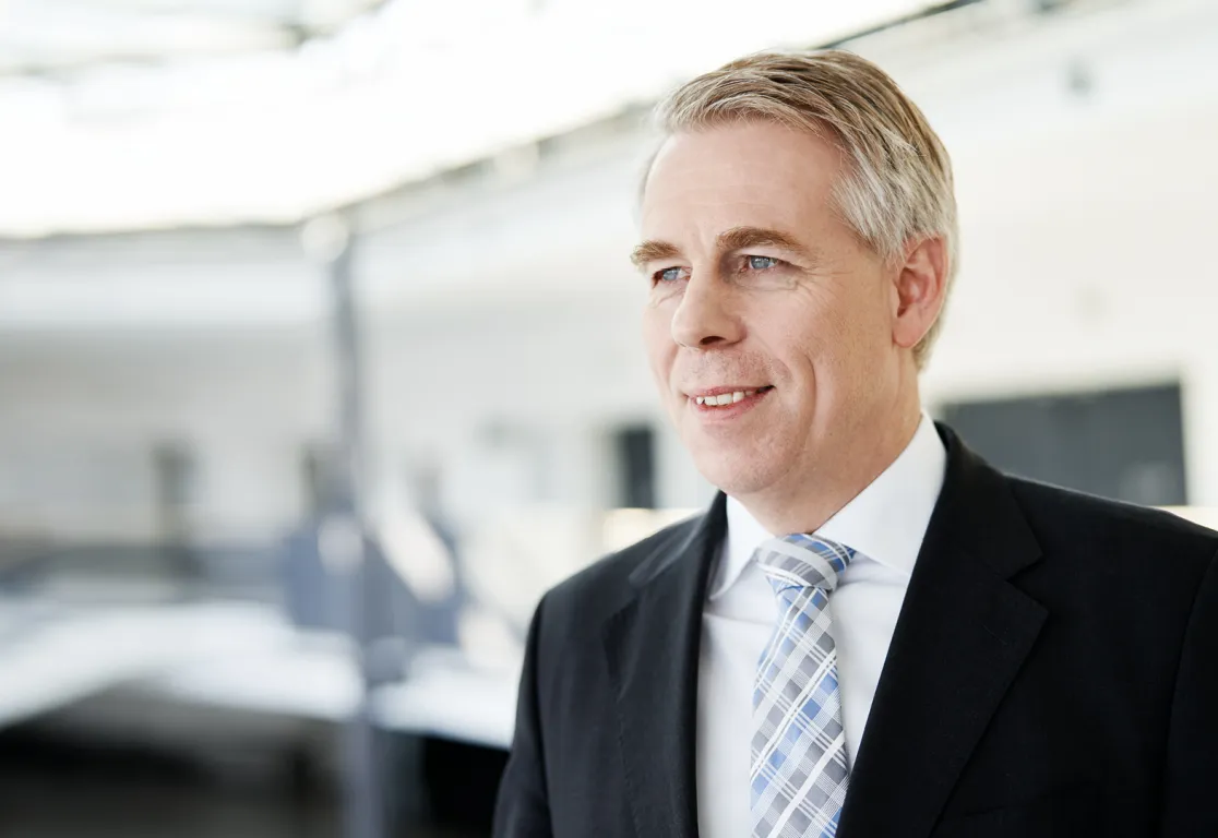 a man in a suit and tie