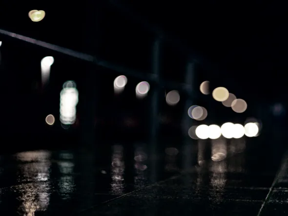 a blurry image of a street at night a blurry image of a street at night