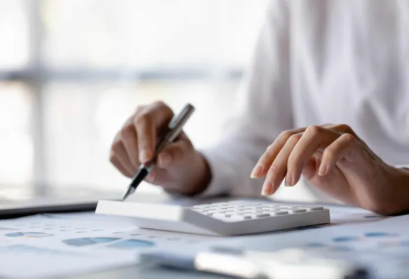 a person using a calculator a person using a calculator
