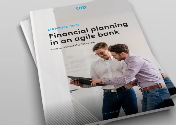 two men looking at a tablet