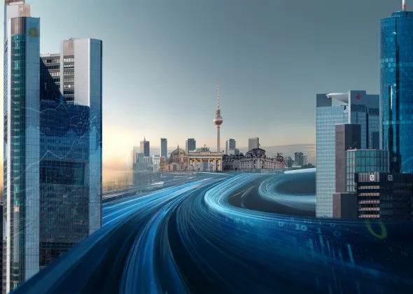 eine Stadt mit einem großen Turm im Hintergrund