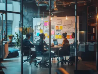 Bedeutung von Agile Coaches in Banken: Warum sie mehr sind als „Methoden- und Workshopmoderator:innen“?