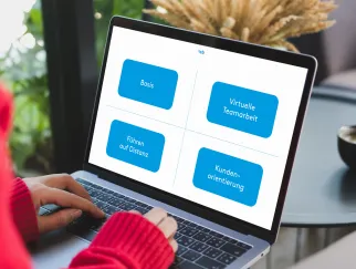 a person typing on a laptop