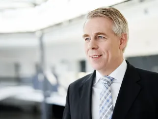 a man in a suit and tie