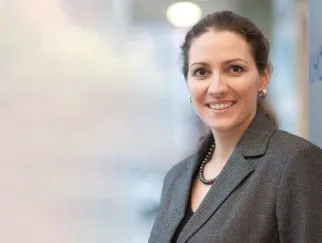 a woman smiling at camera