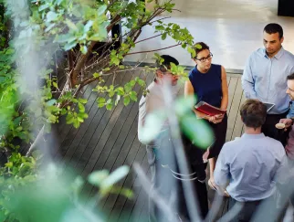 a group of people standing on a deck