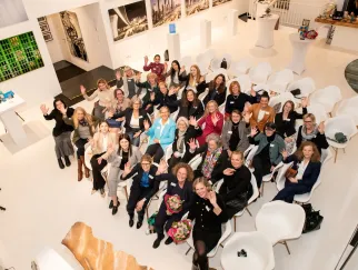 a group of people sitting in chairs