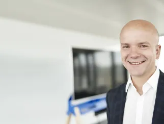 a man smiling at camera a man smiling at camera