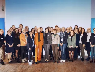 a group of people posing for a photo