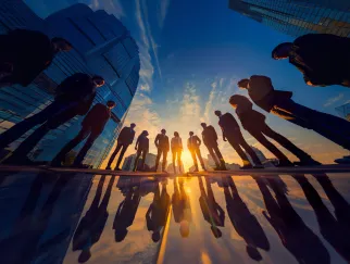 a group of people standing in a circle