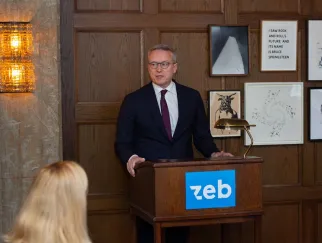 a man standing at a podium