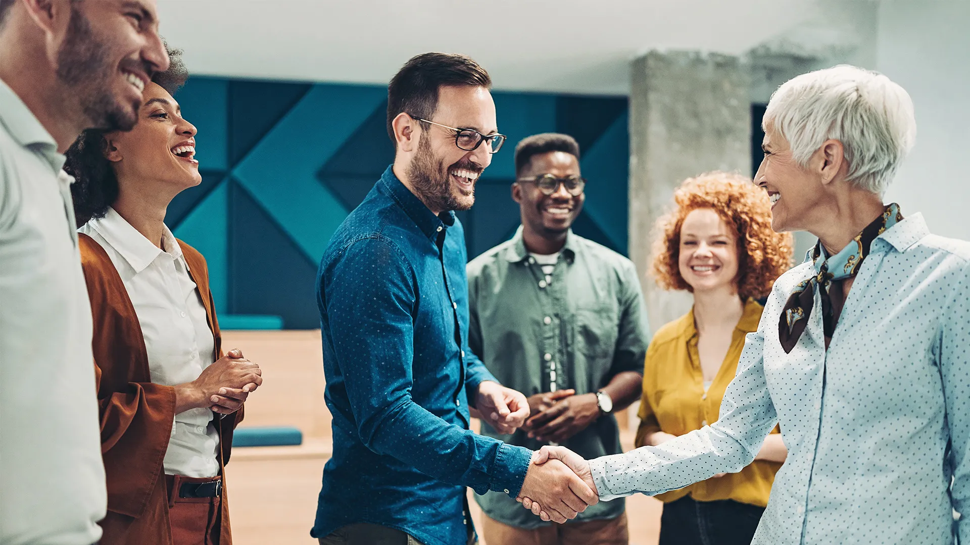 a group of people shaking hands