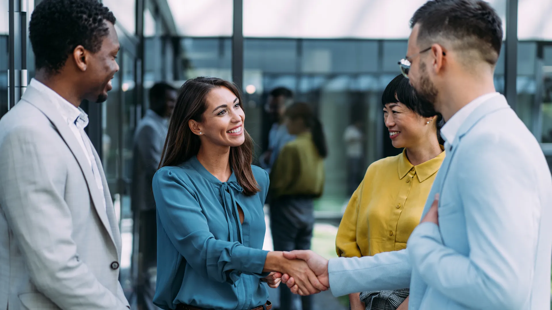 a group of people shaking hands