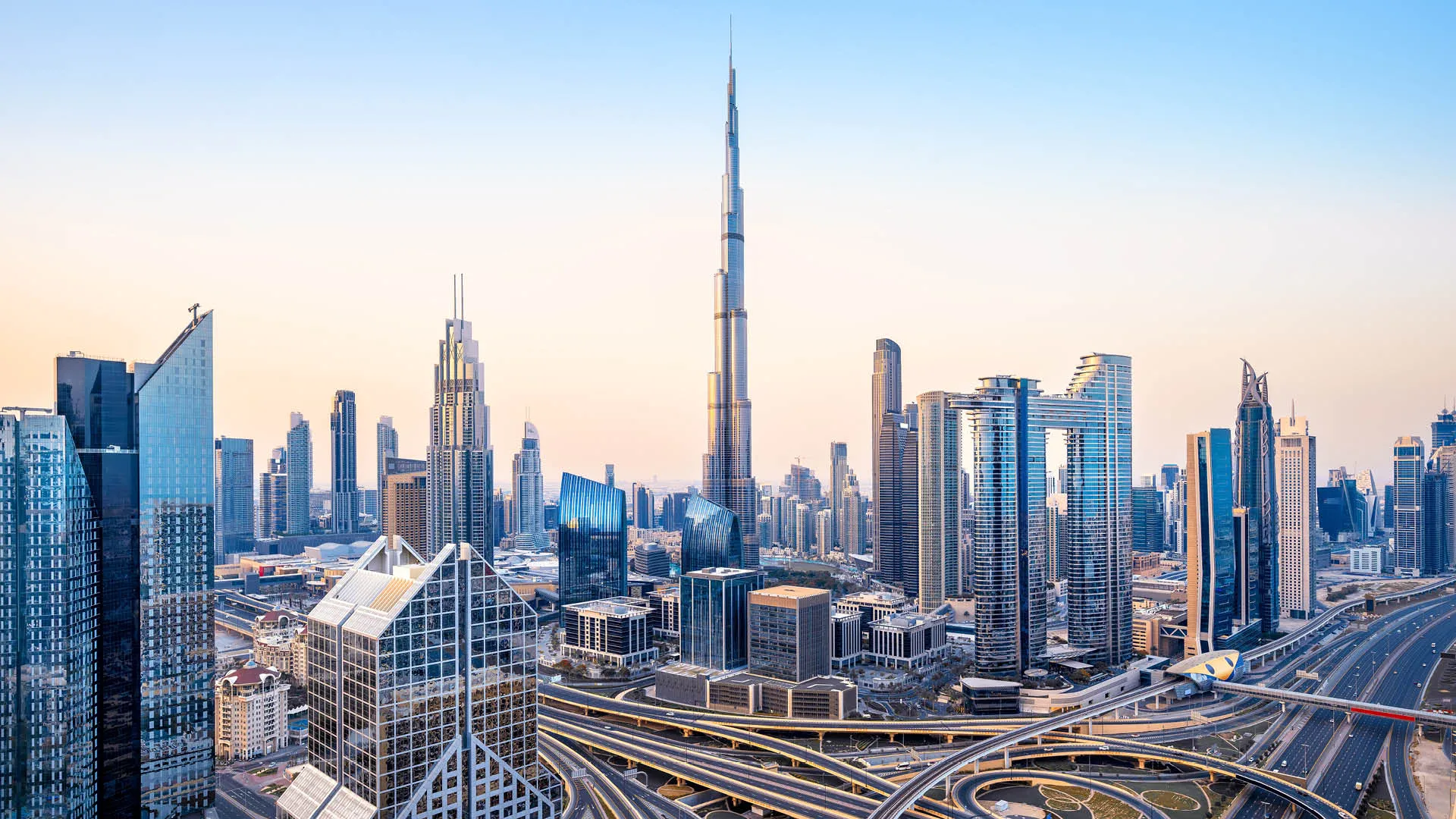 a city skyline with many tall buildings