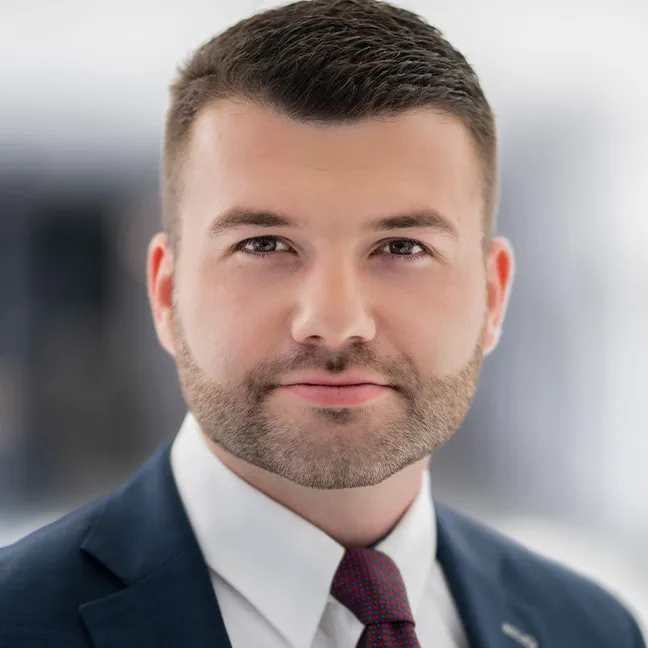 a man in a suit and tie