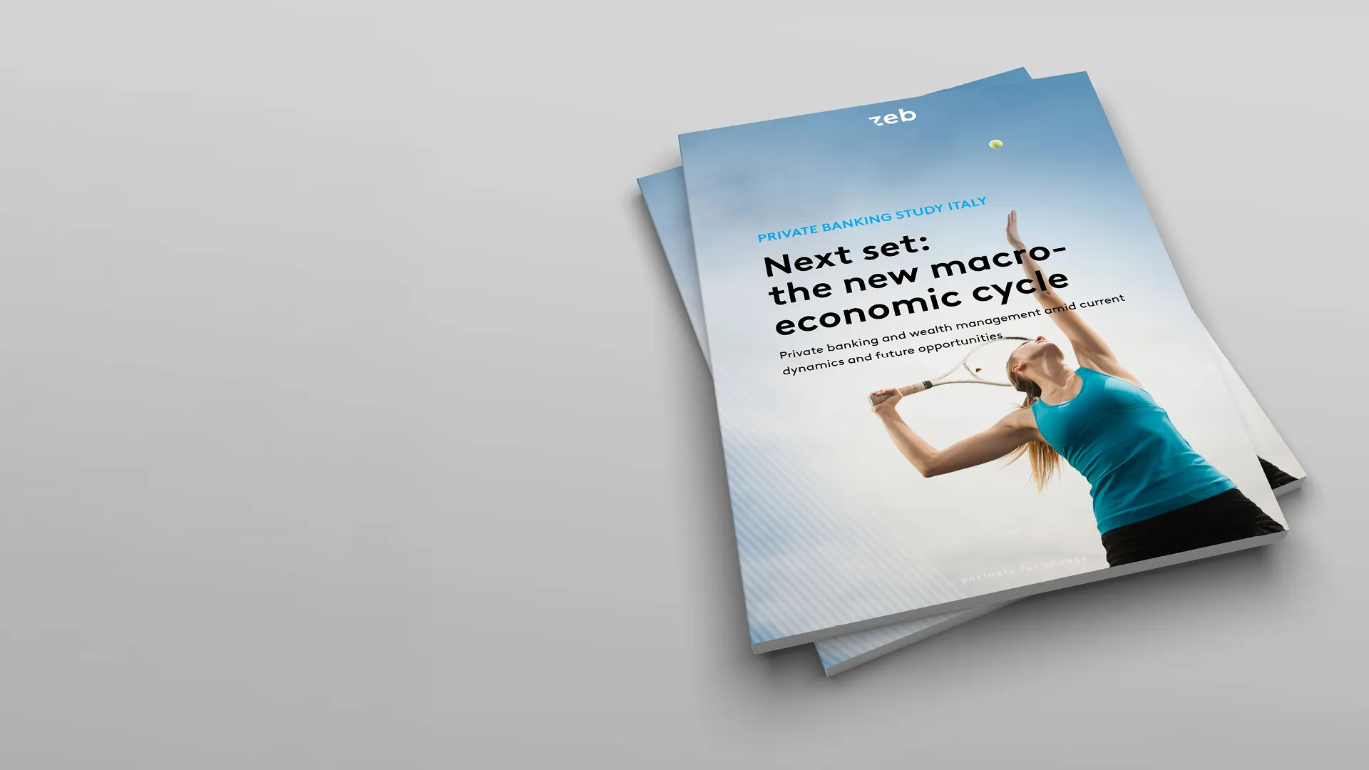 a stack of books with a woman in a blue shirt