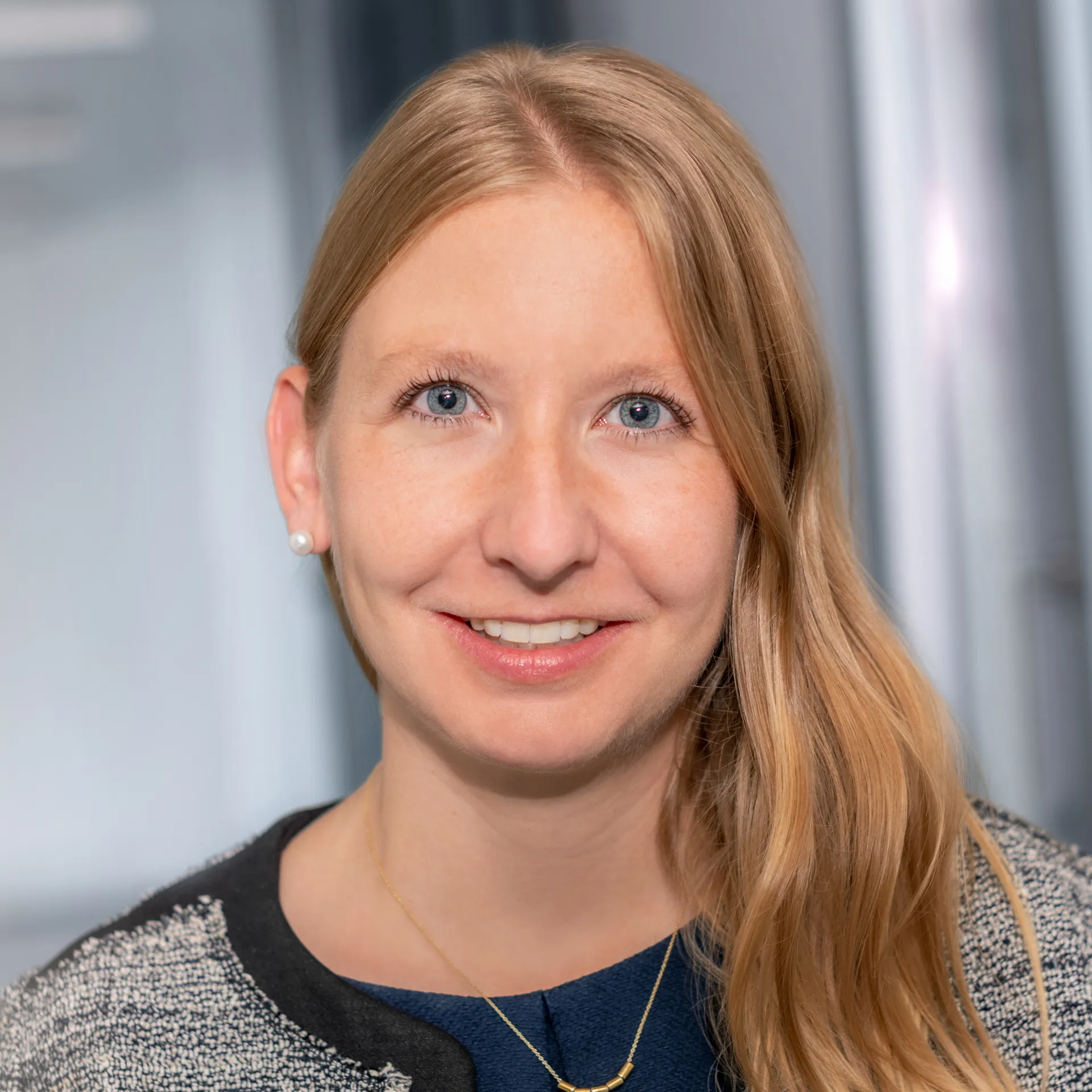 a woman smiling at camera