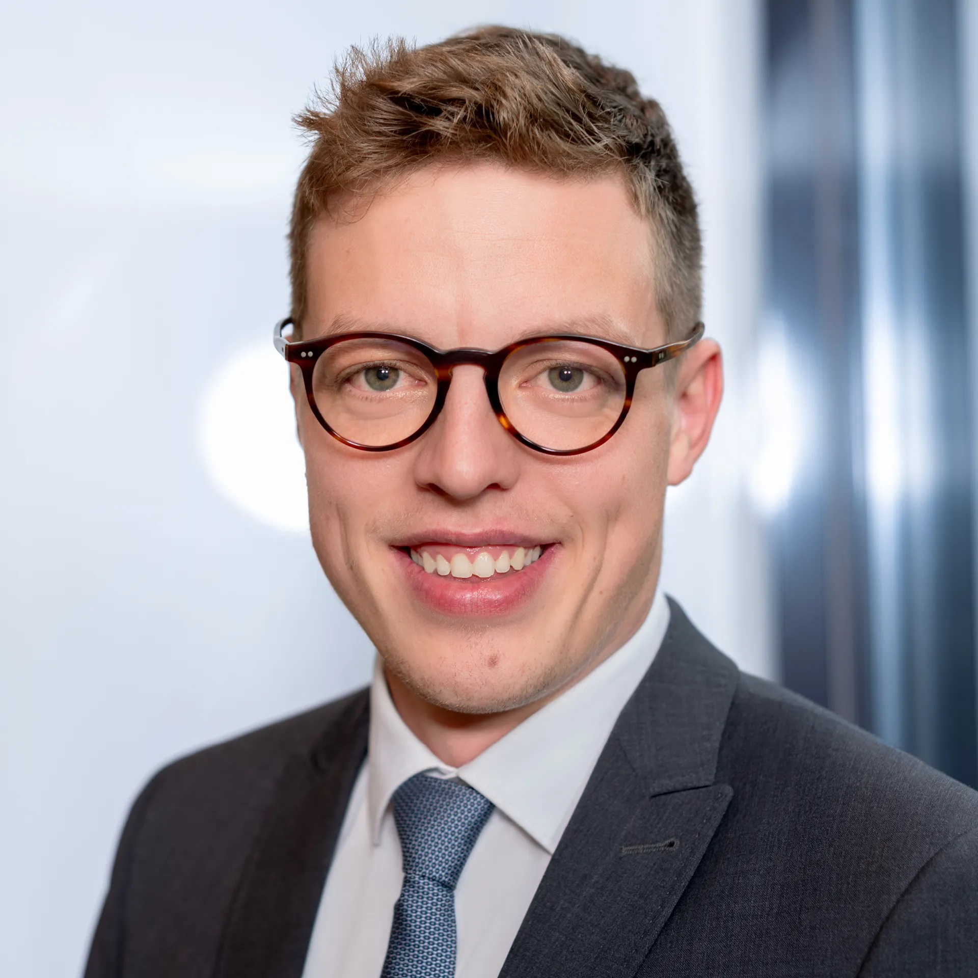 a man in a suit and tie