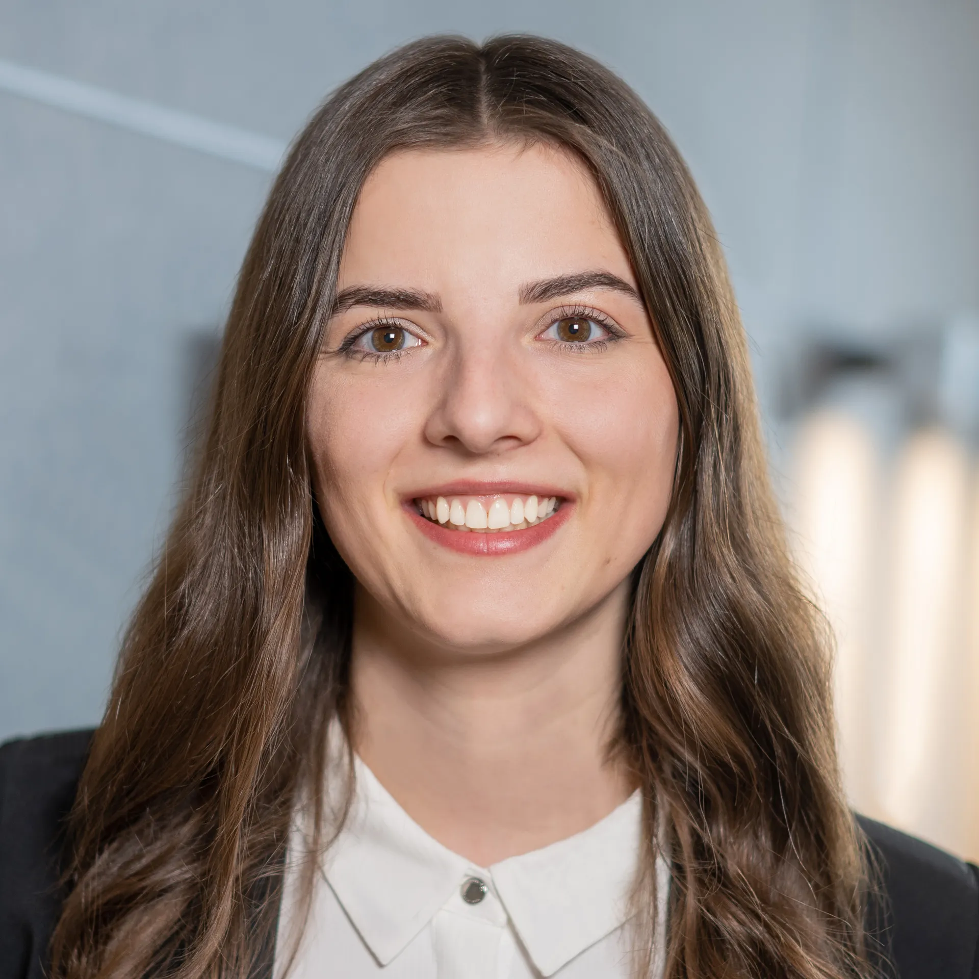 a woman smiling at camera