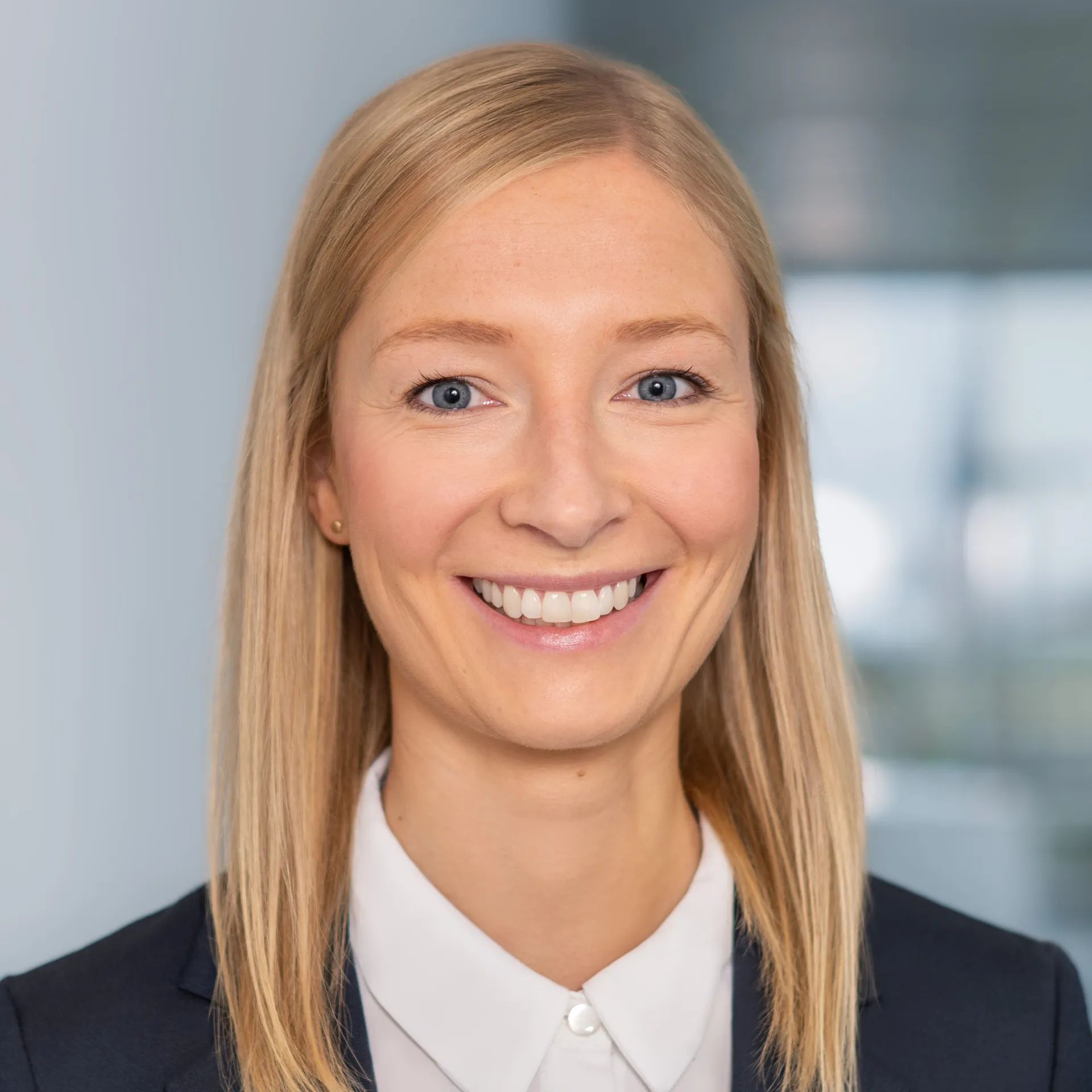 a woman smiling at camera