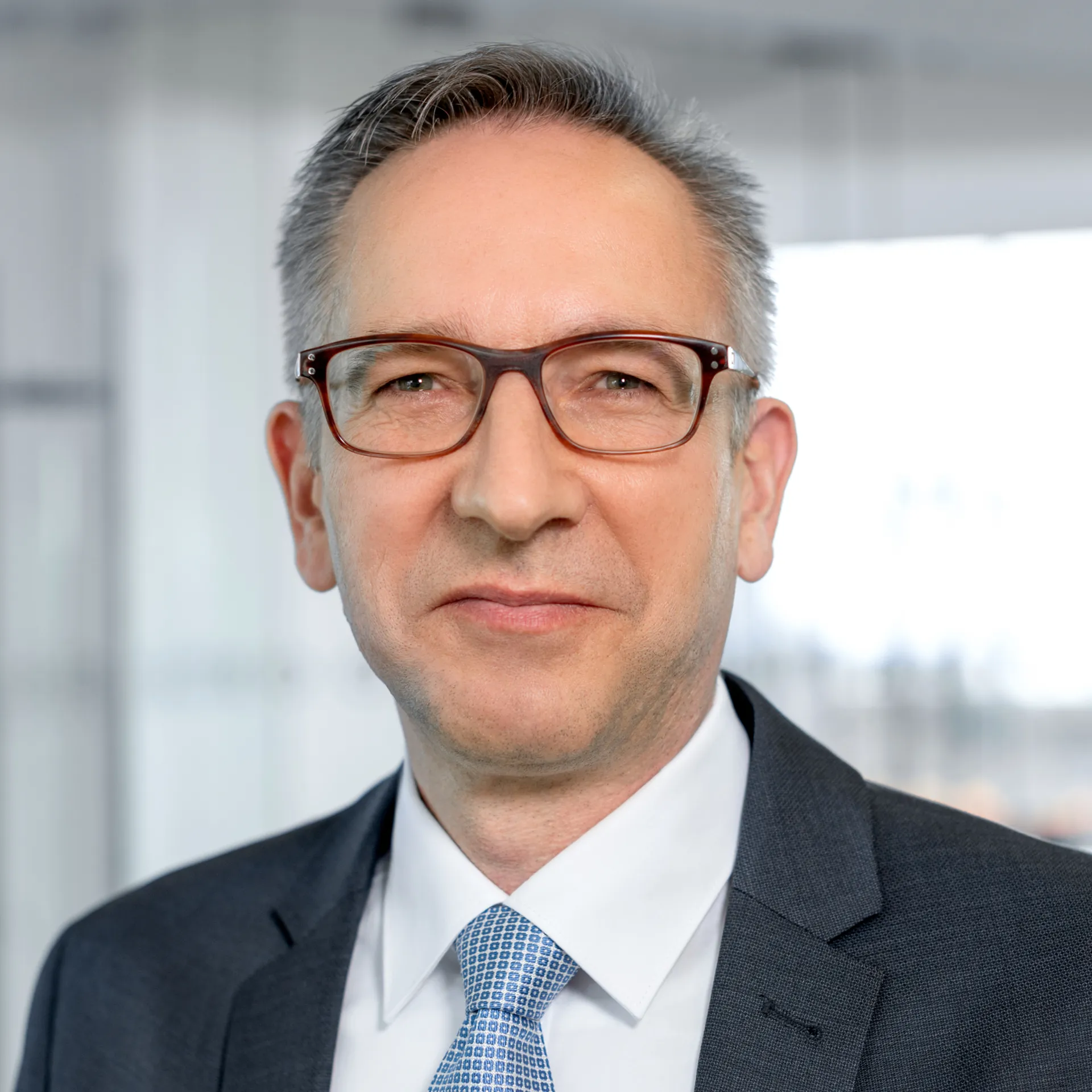 a man in a suit and tie