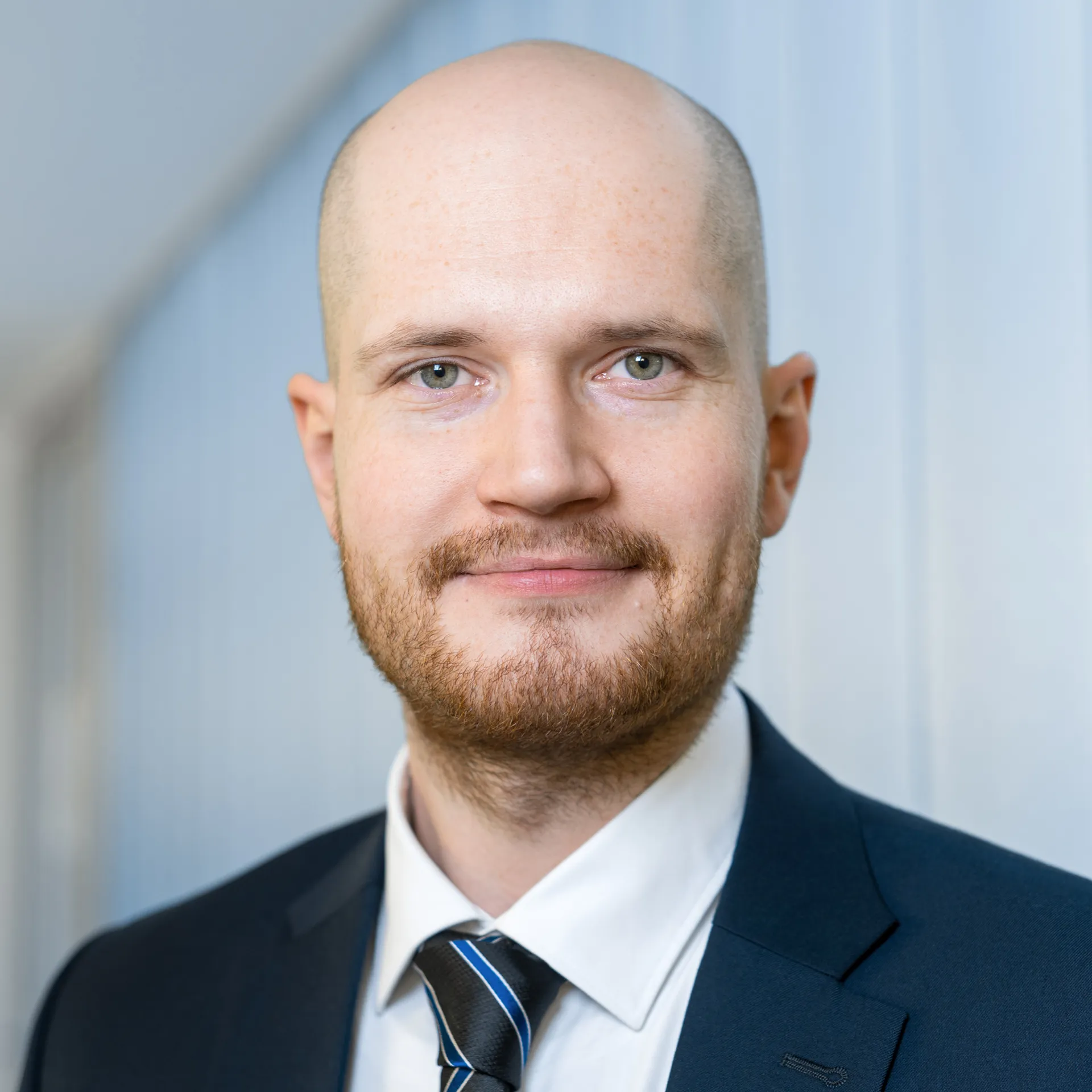 a man in a suit and tie