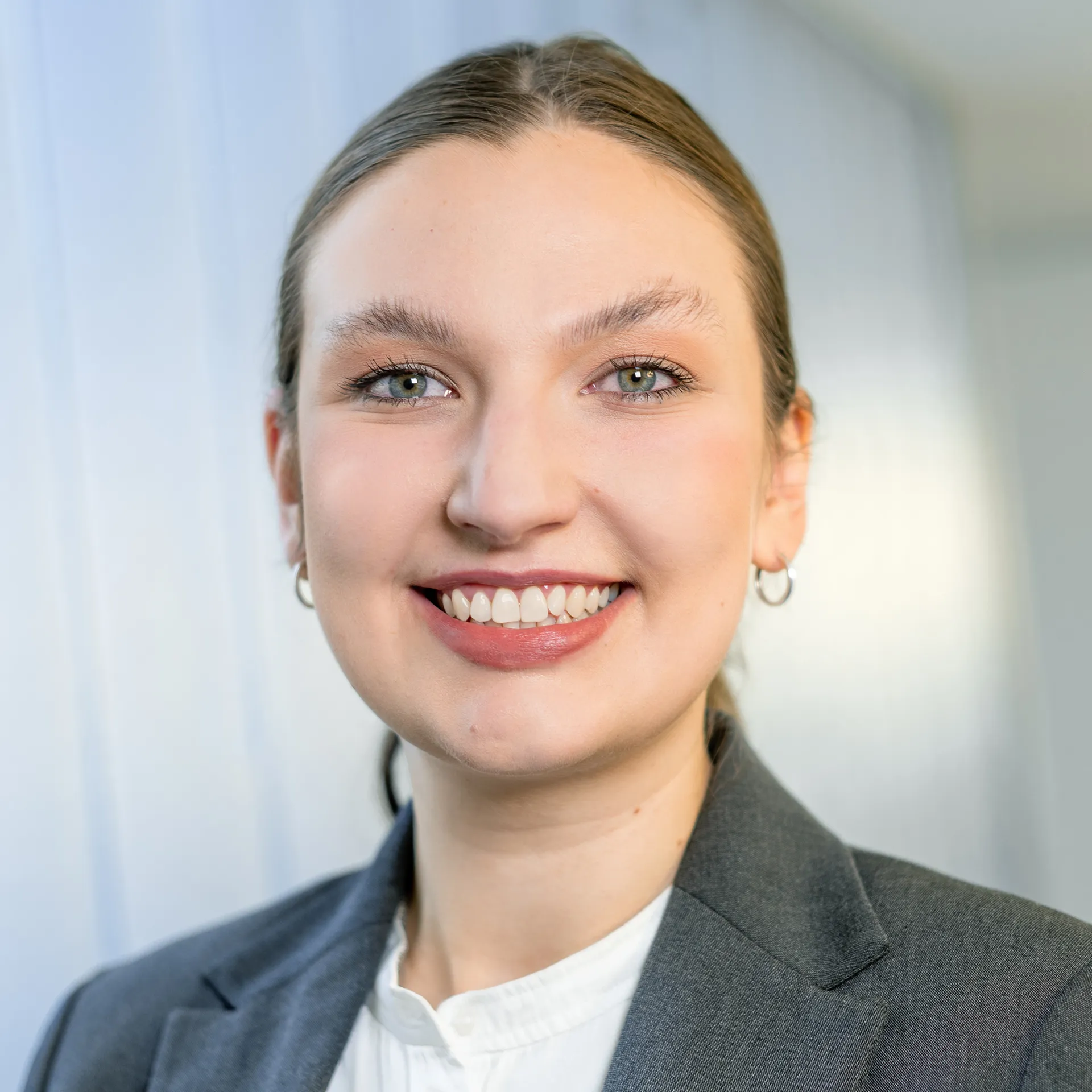 a woman smiling at camera
