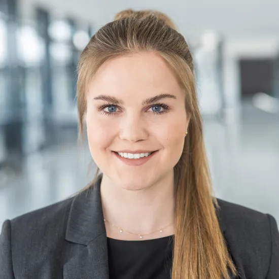 a woman smiling at camera