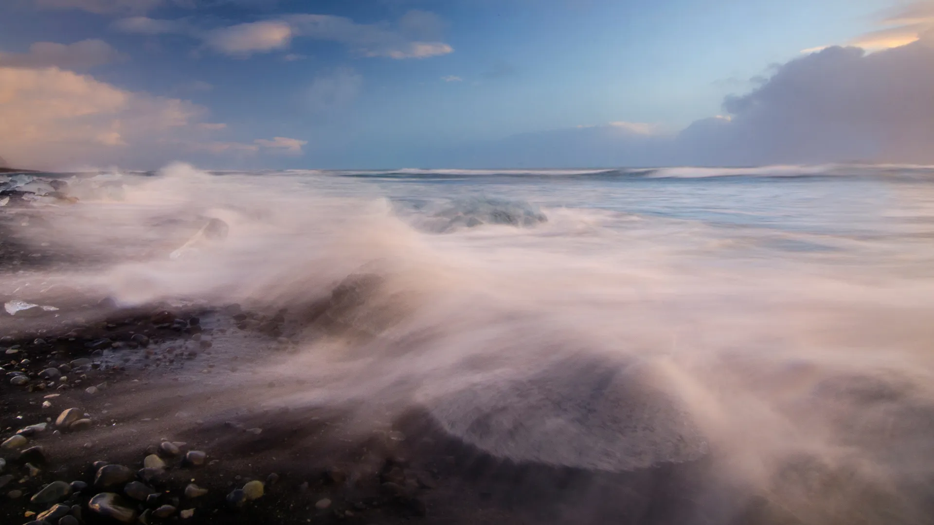waves crashing waves on a rocky beach waves crashing waves on a rocky beach