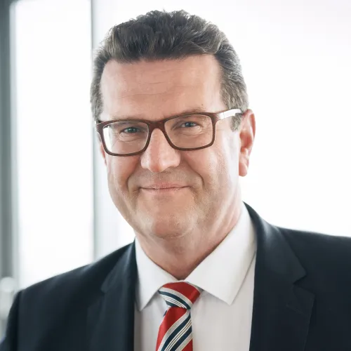 a man in a suit and tie