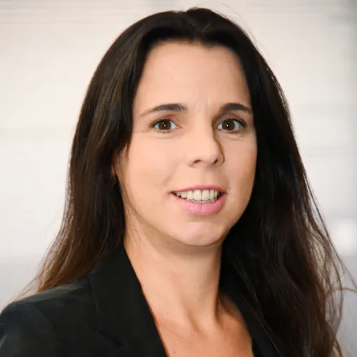 a woman with long hair wearing a black jacket a woman with long hair wearing a black jacket