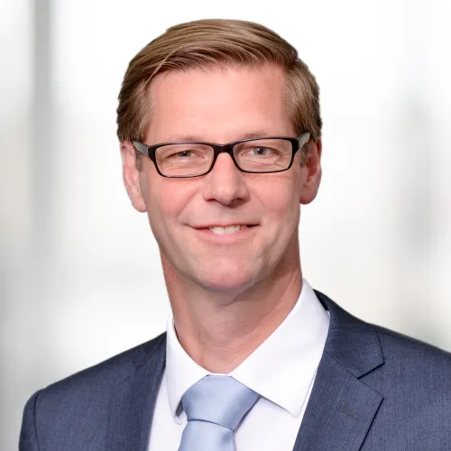 a man in a suit and tie