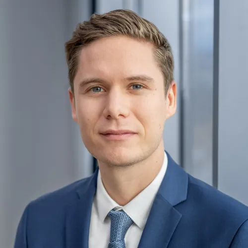 a man in a suit and tie