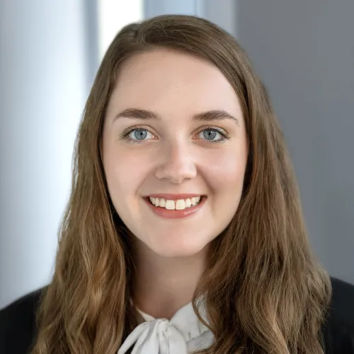 a woman smiling at camera