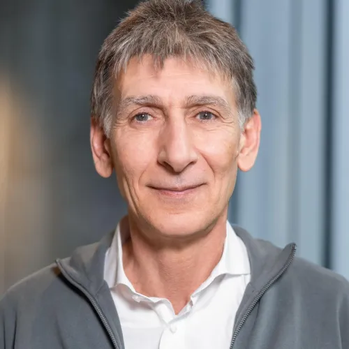 a man in a grey jacket